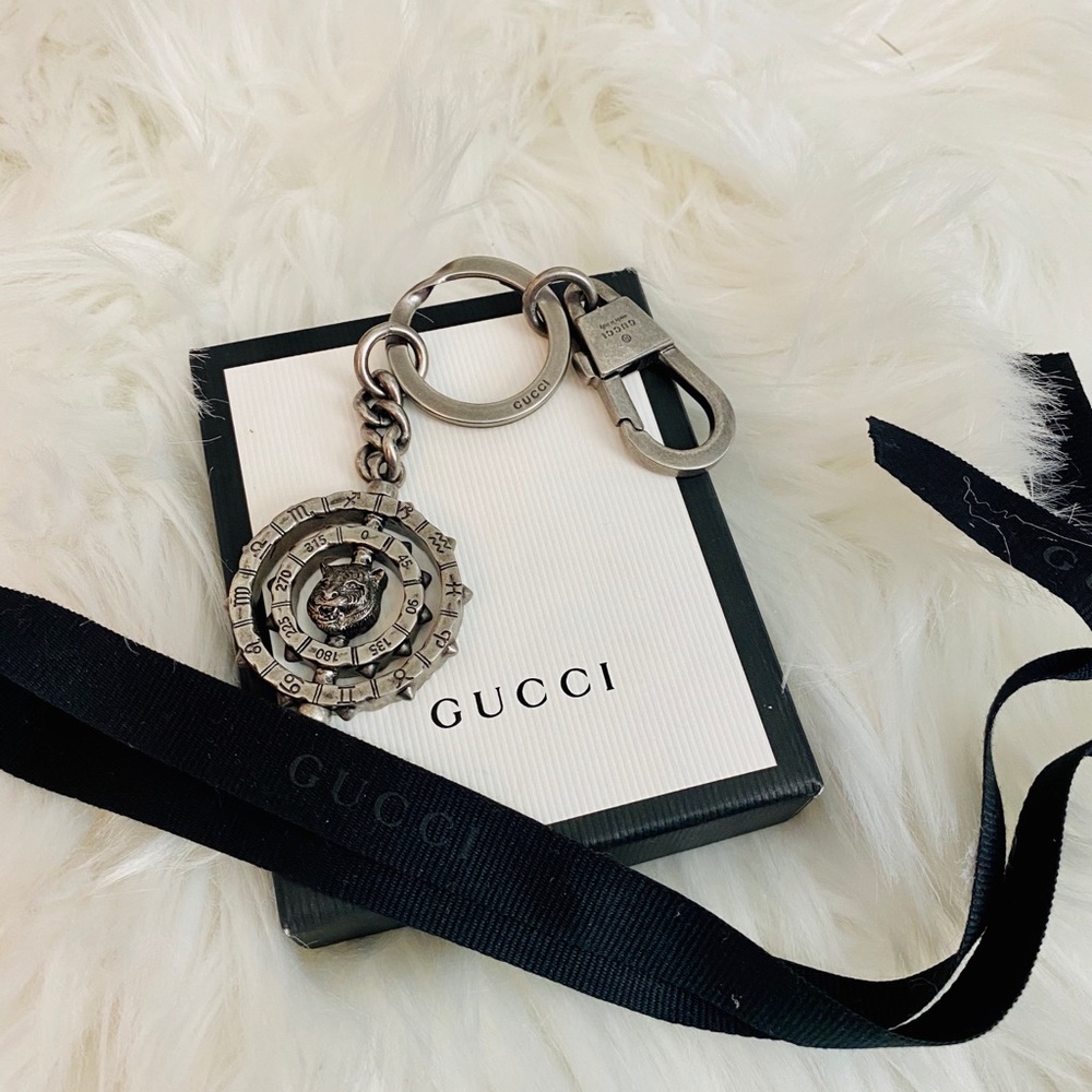 Gucci rotating compass silver keychain